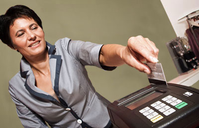 Woman Swiping Credit Card